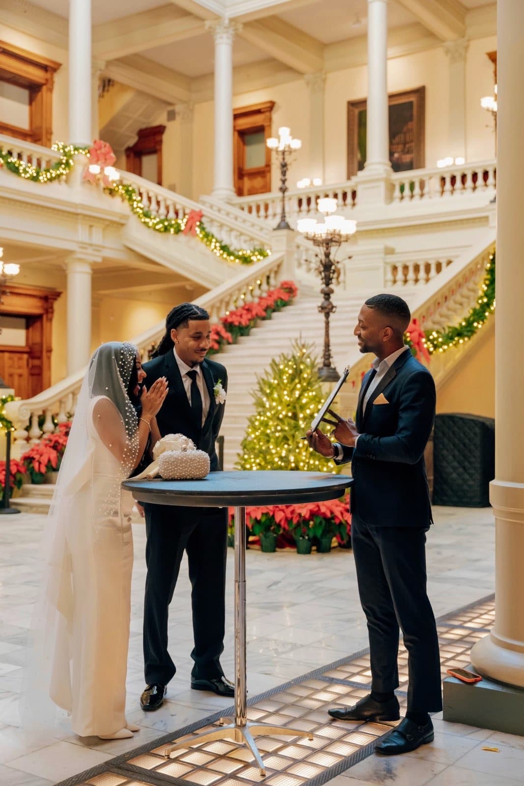 Marriage license signing ceremony at the Georgia State Capitol, Atlanta, officiated by Weddings by Tré